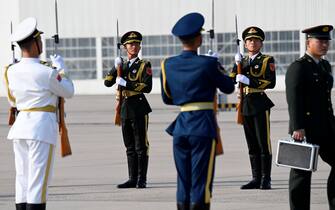 epa10922780 Chinese honor guards prepare for the arrival of Russia's President Vladimir Putin ahead of the Third Belt and Road Forum at Beijing Capital International Airport in Beijing, China, 17 October 2023.  EPA/Parker Song/POOL