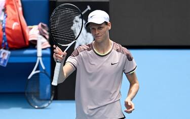 epa11075156 Jannik Sinner of Italy reacts after winning his first round match against Botic van de Zandschulp of the Netherlands on Day 1 of the 2024 Australian Open at Melbourne Park in Melbourne, Australia, 14 January 2024.  EPA/LUKAS COCH AUSTRALIA AND NEW ZEALAND OUT