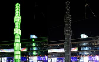 epa11981953 A two-fold combo shows the glass obelisk Kristallvertikalaccent at Sergels Torg square before and after it was turned off during Earth Hour in Stockholm, Sweden, 22 March 2025. Earth Hour takes place worldwide at 8:30 pm local time and is a global call to cut emissions by switching off lights for 60 minutes to raise awareness of the fight against global climatic change.  EPA/Jessica Gow  SWEDEN OUT