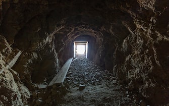 This is an 0.8km long tunnel build by Mr Schmidt Burro within 38 years of construction. I walking through the tunnel and captured the experience when coming out of the dark into the light with a magnificient perspective on the death valley