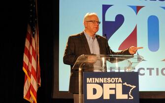 tim walz epa08797422 Minnesota Governor Tim Walz speaks at DFL Election Night at the Intercontinental St. Paul Hotel in St. Paul, Minnesota, USA, 03 November 2020. Americans vote on Election Day to choose between re-electing Donald J. Trump or electing Joe Biden as the 46th President of the United States to serve from 2021 through 2024. EPA/MARILYN INDAHL
