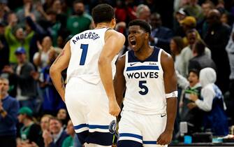 MINNEAPOLIS, MINNESOTA - NOVEMBER 06: Anthony Edwards #5 of the Minnesota Timberwolves celebrates his basket against the Boston Celtics with teammate Kyle Anderson #1 in overtime at Target Center on November 06, 2023 in Minneapolis, Minnesota. The Timberwolves defeated the Celtics 114-109 in overtime. NOTE TO USER: User expressly acknowledges and agrees that, by downloading and or using this photograph, User is consenting to the terms and conditions of the Getty Images License Agreement. (Photo by David Berding/Getty Images)