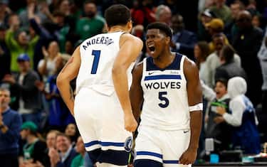 MINNEAPOLIS, MINNESOTA - NOVEMBER 06: Anthony Edwards #5 of the Minnesota Timberwolves celebrates his basket against the Boston Celtics with teammate Kyle Anderson #1 in overtime at Target Center on November 06, 2023 in Minneapolis, Minnesota. The Timberwolves defeated the Celtics 114-109 in overtime. NOTE TO USER: User expressly acknowledges and agrees that, by downloading and or using this photograph, User is consenting to the terms and conditions of the Getty Images License Agreement. (Photo by David Berding/Getty Images)