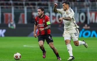 Davide Calabria of AC Milan competes for the ball with Leandro Paredes of AS Roma during UEFA Europa League 2023/24 Quarter Finals - 1st  leg football match between AC Milan and AS Roma at San Siro Stadium, Milan, Italy on April 11, 2024