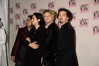Italian rock band Bluvertigo (Italian drummer Sergio Carnevale, Italian bass guitarist and singer Marco Castoldi (Morgan), Italian keyboard player and saxophonist Andrea Fumagalli (Andy), and Italian guitarist Livio Magnini) attend the 1998 MTV Europe Music Awards, held at the Fila Forum in Assago, Milan, Italy, 12th November 1998. (Photo by Vinnie Zuffante/Michael Ochs Archives/Getty Images)