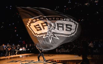 SAN ANTONIO, TX - JUNE 5: Mascot of the San Antonio Spurs holds the logo up during a timeout against the Miami Heat during Game One of the 2014 NBA Finals on June 5, 2014 at AT&T Center in San Antonio, Texas. NOTE TO USER: User expressly acknowledges and agrees that, by downloading and or using this photograph, User is consenting to the terms and conditions of the Getty Images License Agreement. Mandatory Copyright Notice: Copyright 2014 NBAE (Photo by Jesse D. Garrabrant/NBAE via Getty Images)