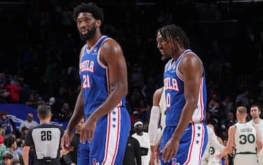 PHILADELPHIA, PA - NOVEMBER 15: Joel Embiid #21 of the Philadelphia 76ers and Tyrese Maxey #0 look on during the game against the Boston Celtics on November 15, 2023 at the Wells Fargo Center in Philadelphia, Pennsylvania NOTE TO USER: User expressly acknowledges and agrees that, by downloading and/or using this Photograph, user is consenting to the terms and conditions of the Getty Images License Agreement. Mandatory Copyright Notice: Copyright 2023 NBAE (Photo by Jesse D. Garrabrant/NBAE via Getty Images)