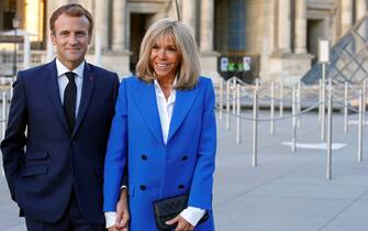 PARIS, FRANCE - SEPTEMBER 27: French President, Emmanuel Macron and his wife Brigitte Macon pose prior to the inauguration of the exhibition "Paris-Athens. Birth of Modern Greece "at the Louvre Museum, this inauguration will be followed by a working dinner at the Elysee Palace on September 27, 2021 in Paris France. Ten days after the humiliation in the Australian submarine affair, Emmanuel Macron and Greek Prime Minister Kyriakos Mitsotakis met on Monday to discuss the purchase of four new generation frigates by Greece. The amount of the contract, if it were signed, would be of the order of 5 billion euros. (Photo by Chesnot/Getty Images)