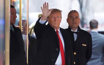 epa11106636 Former US President Donald Trump (C) leaves Trump Tower to attend E. Jean Carroll's defamation case against him in New York, New York, USA, 26 January 2024. Trump testified in his own defense on 25 January and is attending closing arguments today.  EPA/SARAH YENESEL