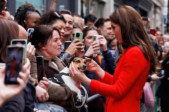 LONDON, ENGLAND - MAY 04: Catherine, Princess of Wales speaks to the gathered public during a walkabout outside the Dog and Duck pub in Soho ahead of this weekend's coronation on May 4, 2023 in London, England. (Photo by Jamie Lorriman - WPA Pool/Getty Images)