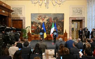 Italy's Prime Minister, Giorgia Meloni and Ukrainian President Volodymyr Zelensky hold a joint press conference following their meeting on May 13, 2023 at Palazzo Chigi in Rome. Ukrainian President Volodymyr Zelensky arrived in Rome on May 13 for meetings with President of Italy Sergio Mattarella, Prime Minister Giorgia Meloni and Pope Francis in his first visit to Italy since Russia's invasion. (Photo by Alberto PIZZOLI / AFP) (Photo by ALBERTO PIZZOLI/AFP via Getty Images)