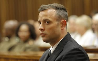 epa05363389 South African Paralympian Oscar Pistorius is seen inside the dock at the high court in Pretoria for his sentencing hearing at the high court in Pretoria, South Africa, 14 June 2016. The Supreme Court of South Africa overturned the High Court's verdict in December 2015, where Oscar Pistorius now faces sentencing for the murder of his girlfriend Reeva Steenkamp on 13 February 2013.  EPA/KIM LUDBROOK / POOL