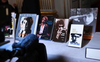 A cameraman films books by US songwriter Bob Dylan who was announced the laureate of the 2016 Nobel Prize in Literature at the Swedish Academy in Stockholm, Sweden, on October 13, 2016.
US songwriter Bob Dylan wins the 2016 Nobel Literature Prize. / AFP / JONATHAN NACKSTRAND        (Photo credit should read JONATHAN NACKSTRAND/AFP via Getty Images)