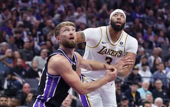 SACRAMENTO, CALIFORNIA - OCTOBER 29: Domantas Sabonis #10 of the Sacramento Kings competes for a rebound against Anthony Davis #3 of the Los Angeles Lakers in the first quarter at Golden 1 Center on October 29, 2023 in Sacramento, California. NOTE TO USER: User expressly acknowledges and agrees that, by downloading and or using this photograph, User is consenting to the terms and conditions of the Getty Images License Agreement. (Photo by Lachlan Cunningham/Getty Images)