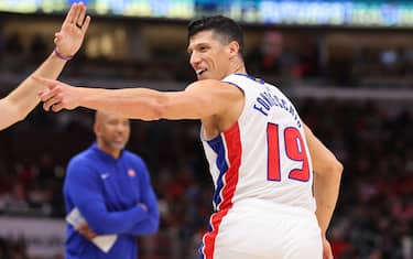 CHICAGO, ILLINOIS - FEBRUARY 27: Simone Fontecchio #19 of the Detroit Pistons celebrates a three pointer against the Chicago Bulls during the second half at the United Center on February 27, 2024 in Chicago, Illinois. NOTE TO USER: User expressly acknowledges and agrees that, by downloading and or using this photograph, User is consenting to the terms and conditions of the Getty Images License Agreement. (Photo by Michael Reaves/Getty Images)