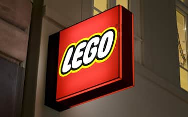 Wiesbaden, Germany - March 10, 2011: Illuminated sign of Lego Store in the center of Wiesbaden, Germany. Lego Group is a construction toys manufacturer based in Billund, Denmark. LEGO toys are made out of colorful hard plastic construction blocks.