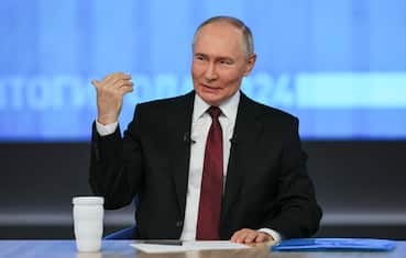 epa11785013 Russian President Vladimir Putin gestures as he answers questions during his annual live broadcast press conference with Russian federal, regional, and foreign media at the Gostiny Dvor forum hall in Moscow, Russia, 19 December 2024.Russian President Vladimir Putin on 19 December holds his end-of-year press conference and the 'Direct Line with Vladimir Putin' televised event, where he will answer citizens' questions focusing on domestic issues.  EPA/YURI KOCHETKOV