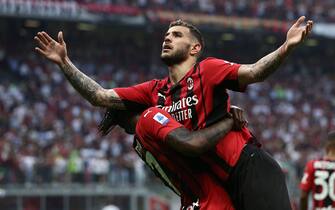 Theo Hernandez (AC Milan) celebrates with Rafael Leao (AC Milan) after scoring his side's second goal of the match  during  AC Milan vs Atalanta BC, italian soccer Serie A match in Milan, Italy, May 15 2022
