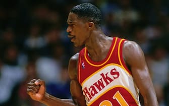 LOS ANGELES - 1987: Dominique Wilkins #21 of the Atlanta Hawks reacts during a game played circa 1987 at the LA Sports Arena in Los Angeles, California. NOTE TO USER: User expressly acknowledges and agrees that, by downloading and or using this photograph, User is consenting to the terms and conditions of the Getty Images License Agreement. Mandatory Copyright Notice: Copyright 1987 NBAE (Photo by Andrew D. Bernstein/NBAE via Getty Images)