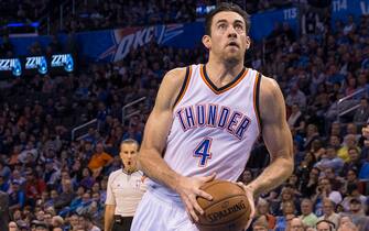 OKLAHOMA CITY, OK - DECEMBER 14: Nick Collison #4 of the Oklahoma City Thunder drives against the Phoenix Suns at the Chesapeake Energy Arena  on December 14, 2013 in Oklahoma City, Oklahoma. NOTE TO USER:  User expressly acknowledges and agrees that, by downloading and/or using this photograph, user is consenting to the terms and conditions of the Getty Images License Agreement. Mandatory Copyright Notice:  Copyright 2014 NBAE (Photo by Richard Rowe/NBAE via Getty Images)