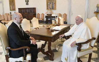 An image release by Vatican media shows Pope Francis (R) during a meeting with the Prime Minister of Ukraine, Denys Smyhal, Vatican City, 27 April 2023. ANA/ VATICAN MEDIA ++HO - NO SALES EDITORIAL USE ONLY++