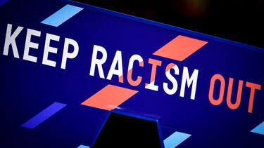 STADIO GIUSEPPE MEAZZA, MILAN, ITALY - 2023/03/13: The write 'Keep racism out' on the Serie A archway structure is seen prior to the Serie A football match between AC Milan and US Salernitana. The match ended 1-1 tie. (Photo by NicolÃ² Campo/LightRocket via Getty Images)