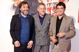 MILAN, ITALY - MARCH 13: Stefano Mordini, Lapo Elkann and Riccardo Scamarcio attend the photocall for "Race For Glory" on March 13, 2024 in Milan, Italy. (Photo by Stefania D'Alessandro/Getty Images)