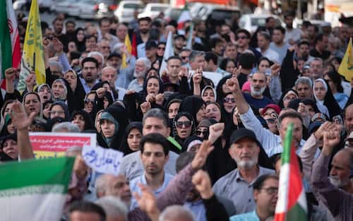 Iranian protesters shout anti-U.S. and anti-Israeli slogans while participating in a protest to condemn the U.S. attacks on Iran's nuclear facilities in downtown Tehran, Iran, on June 22, 2025, amid the Iran-Israel war. (Photo by Morteza Nikoubazl/NurPhoto via Getty Images)