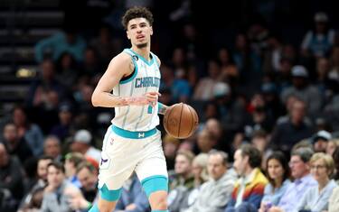 CHARLOTTE, NORTH CAROLINA - FEBRUARY 13: LaMelo Ball #1 of the Charlotte Hornets brings the ball down the court during the first period of a basketball game against the Atlanta Hawks at Spectrum Center on February 13, 2023 in Charlotte, North Carolina. NOTE TO USER: User expressly acknowledges and agrees that, by downloading and or using this photograph, User is consenting to the terms and conditions of the Getty Images License Agreement. (Photo by David Jensen/Getty Images)