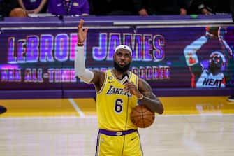 Los Angeles Lakers forward, LeBron James celebrates after scoring to pass Kareem Abdul-Jabbar to become the NBA's all-time leading scorer during an NBA basketball game against the Oklahoma City Thunder.