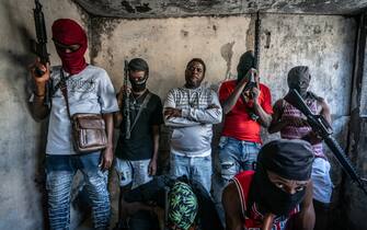 Jimmy 'Barbeque' Cherizier with G-9 federation gang members in the Delmas 3 area of Port au Prince, Haiti.

Jimmy 'Barbeque' Cherizier with G-9 federation gang members in the Delmas 3 area of Port au Prince, Haiti.