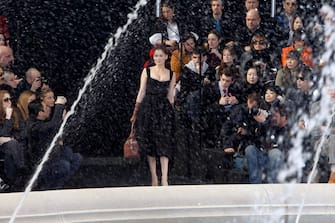 PARIS - MARCH 10:  Laetitia Casta walks the runway during the Louis Vuitton Ready to Wear show as part of the Paris Womenswear Fashion Week Fall/Winter 2011 at Cour Carree du Louvre on March 10, 2010 in Paris, France. (Photo by Michel Dufour/WireImage)