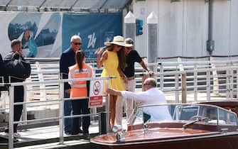 George and Amal Clooney arrive in Venice for the city's film festival. Amal wears a yellow dress.

Pictured: amal clooney,george clooney
Ref: BLU_S7884462 300824 NON-EXCLUSIVE
Picture by:  / SplashNews.com

Splash News and Pictures
USA: 310-525-5808 
UK: 020 8126 1009
eamteam@shutterstock.com

World Rights, No France Rights