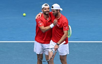 epa11846136 Andrea Vavassori (R) and Simone Bolelli of Italy celebrate winning their men s doubles semi-final match against Andre Goransson of Sweden and Sem Verbeek of the Netherlands at the Australian Open tennis tournament in Melbourne, Australia, 23 January 2025.  EPA/JAMES ROSS AUSTRALIA AND NEW ZEALAND OUT