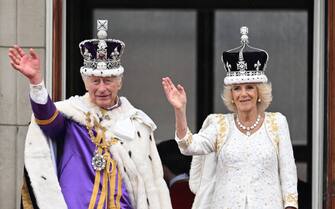 King Charles III and Queen Camilla appear on the balcony of Buckingham Palace during the Coronation in LondonKing Charles III and Queen Camilla wave to the public below from the balcony of Buckingham Palace after King Charles's Coronation at Westminster Abbey in London on Saturday, May 06, 2023.//04SIPA_Sipa.08548/Credit:Zak Hussein/SIPA/2305061841