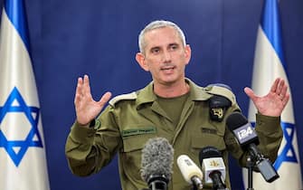 Israeli army spokesman Rear Admiral Daniel Hagari speaks to the press from The Kirya, which houses the Israeli Ministry of Defence, in Tel Aviv on October 18, 2023. A blast ripped through a hospital in war-torn Gaza killing hundreds of people late on October 17, sparking global condemnation and angry protests around the Muslim world. Spokesman Hagari on October 18 said that Israel had "evidence" that militants were responsible for the blast that killed hundreds at a Gaza hospital, saying a review proved others were at fault. (Photo by GIL COHEN-MAGEN / AFP) (Photo by GIL COHEN-MAGEN/AFP via Getty Images)