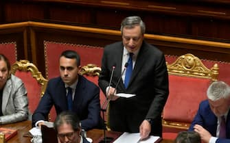 Italy's Prime Minister, Mario Draghi, flanked by ministers during the Senate confidence vote on his government, Rome 20 July 2022. ANSA/CLAUDIO PERI