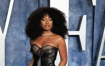 epa10520961 Megan Thee Stallion arrives at the 2023 Vanity Fair Oscar Party following the 95th annual Academy Awards ceremony, at the Wallis Annenberg Center for the Performing Arts in Beverly Hills, California, USA, 12 March 2023. The Oscars are presented for outstanding individual or collective efforts in filmmaking in 24 categories.  EPA/NINA PROMMER