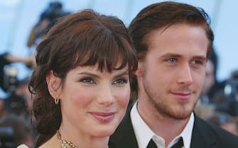 405847 06: American actress Sandra Bullock (L) and actor Ryan Gosling arrive at the Festival Palace before the screening of the film " Murder by Numbers" Friday, May 24, 2002 at the 55th International Film Festival in Cannes, France. (Photo by Pascal Le Segretain/GettyImages)