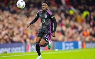 Alphonso Davies (19) of Bayern Munich during the UEFA Champions League, Group A football match between Manchester United and Bayern Munich on 12 December 2023 at Old Trafford in Manchester, England