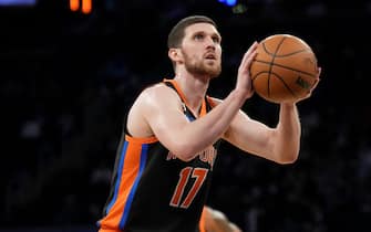 NEW YORK, NY - DECEMBER 20: Svi Mykhailiuk #17 of the New York Knicks shoots a free throw during the game against the Golden State Warriors on December 20, 2022 at Madison Square Garden in New York City, New York.  NOTE TO USER: User expressly acknowledges and agrees that, by downloading and or using this photograph, User is consenting to the terms and conditions of the Getty Images License Agreement. Mandatory Copyright Notice: Copyright 2022 NBAE  (Photo by Jesse D. Garrabrant/NBAE via Getty Images)