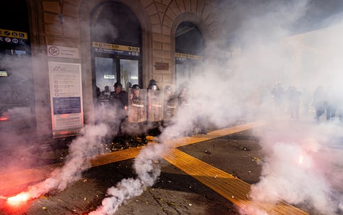 BOLOGNA, ITALY - OCTOBER 2: Students in the demonstration in solidarity with Global Sumud flotilla clash with law enforcement (Carabinieri and Police) while attempting to enter and occupy the central train station on October 2, 2025 in Bologna, Italy. This week, Israeli forces seized several ships bound for Gaza as a flotilla of activists tried to breach Israel's blockade of the Palestinian territory. (Photo by Massimiliano Donati/Getty Images)