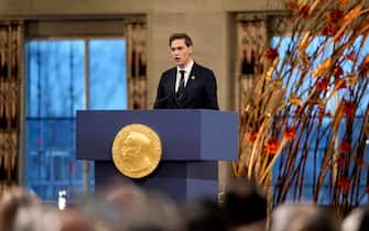epa11768023 Chairman of the Nobel Committee, Jorgen Watne Frydnes, gives a speech during the 2024 Nobel Peace Prize award ceremony at the Oslo City Hall, Norway, 10 December 2024. The Nobel Peace Prize 2024 will go to the The Japan Confederation of A- and H-Bomb Sufferers Organizations, known as Nihon Hidankyo, a grassroots movement of atomic bomb survivors from Hiroshima and Nagasaki that was formed in 1956.  EPA/HEIKO JUNGE / POOL NORWAY OUT