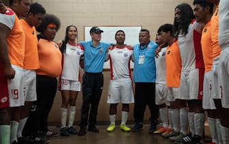 USA. Michael Fassbender and Kaimana  in (C)Searchlight Pictures: Next Goal Wins (2023).
Plot: American Samoa field a football team for 2014 World Cup qualifiers. They have a very poor record against nearly every other side they have played. Will their luck change?
Ref: LMK106-J10337-011223
Supplied by LMKMEDIA. Editorial Only. Landmark Media is not the copyright owner of these Film or TV stills but provides a service only for recognised Media outlets. pictures@lmkmedia.com