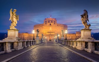 Rome, Italy at Castel Sant'Angelo during twilight.