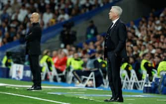 epa11268237 Real Madrid's head coach Carlo Ancelotti follows the UEFA Champions League quarter finals first leg soccer match soccer match between Real Madrid and Manchester City, in Madrid, Spain, 09 April 2024.  EPA/JuanJo Martin