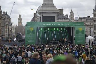 LONDON, UNITED KINGDOM - MARCH 12: People gather for a at the Trafalgar Square during the Saint Patrick's Day Festival in London, United Kingdom on March 12, 2023. Saint PatrickÃ¢s Day is one of the IrelandÃ¢s national days. Associations, sports clubs and orchestras from various regions of United Kingdom and Ireland, citizens of other countries living in London attended the Saint PatrickÃ¢s Day celebrations with their traditional costumes, make-up and music. (Photo by Rasid Necati Aslim/Anadolu Agency via Getty Images)