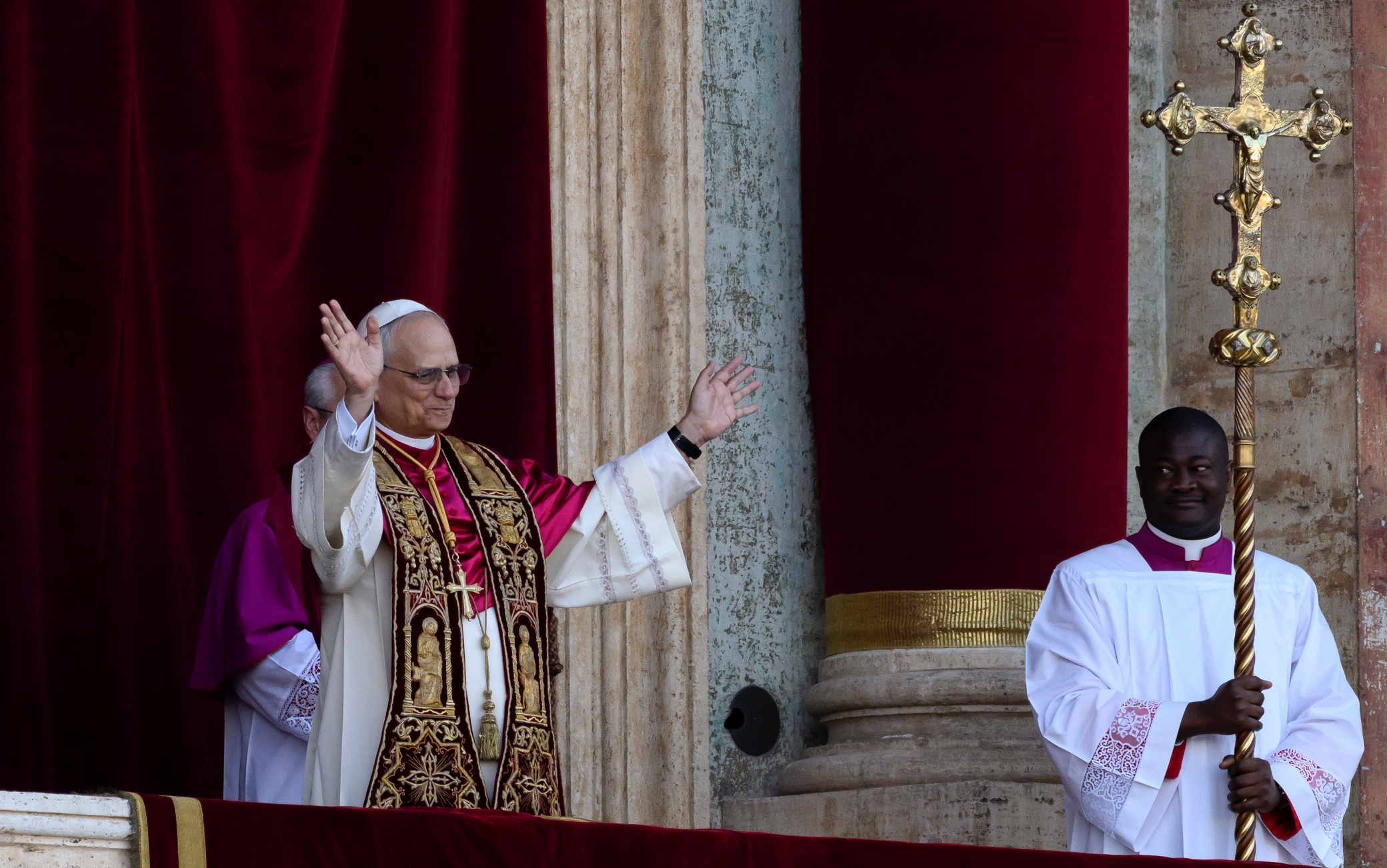 VATICAN CITY, VATICAN - MAY 8: The newly elected Pontiff, Pope Leo XIV is seen for the first time from the Vatican balcony on May 8, 2025 in Vatican City, Vatican. Cardinal Robert Prevost will be known as Pope Leo XIV. White smoke was seen over the Vatican early this evening as the Conclave of Cardinals took just two days to elect the new Pontiff after the death of Pope Francis on Easter Monday. (Photo by Antonio Masiello/Getty Images)