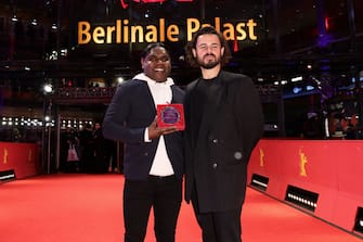 BERLIN, GERMANY - FEBRUARY 25: Derik Lynch and Matthew Thorne pose on the red carpet with the Silver Bear Jury Prize for their film "Marungka Tjalatjunu" (Dipped in Black) after the award ceremony of the 73rd Berlinale International Film Festival Berlin at Berlinale Palast on February 25, 2023 in Berlin, Germany. (Photo by Andreas Rentz/Getty Images)