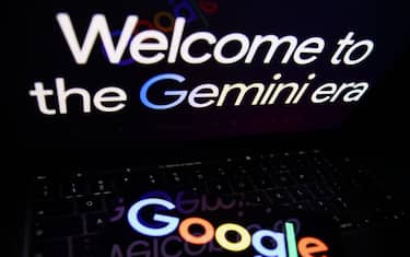 Gemini on website displayed on a laptop screen and Google logo displayed on a phone screen are seen in this illustration photo taken in Krakow, Poland on December 6, 2023. (Photo by Jakub Porzycki/NurPhoto via Getty Images)